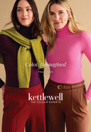 Two women modeling autumn clothing from Kettlewell, featuring a deep purple mock-neck top with a chunky olive green scarf, and a bright pink mock-neck top with brown trousers. Text overlays read 'Colour.
